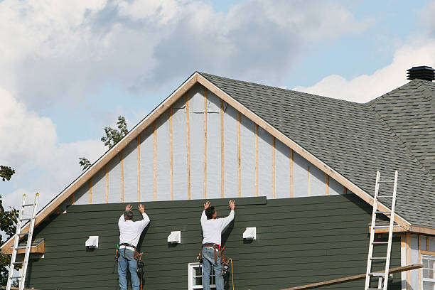 Professional Siding technician working in Germantown, IL